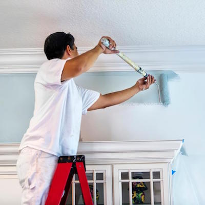 Painter preparing for the installation of your Prestige Kitchen
